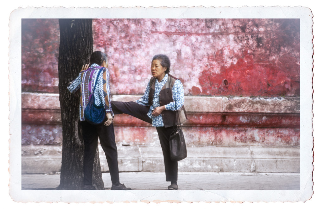 Postcard photograph of two elderly ladies chatting while exercising, Beijing, China